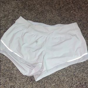 white lululemon shorts